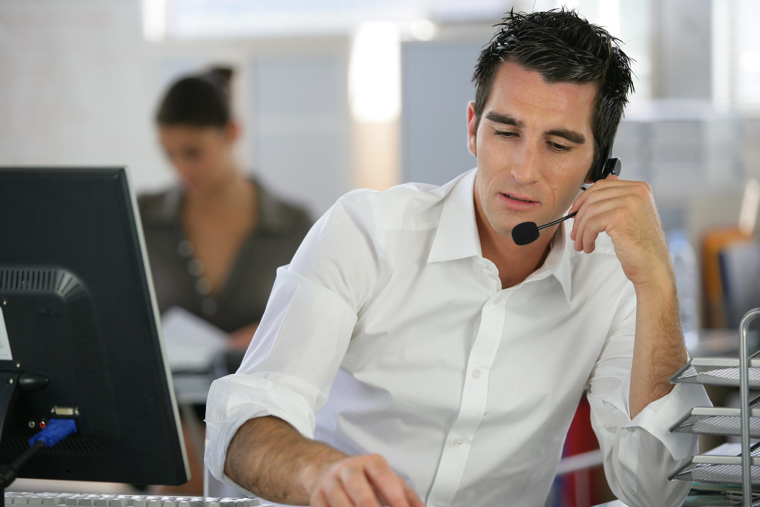 Call centre agent providing customer support over the phone.