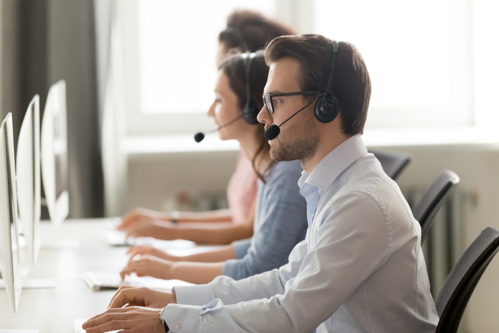 Call centre agents speaking on the phone.