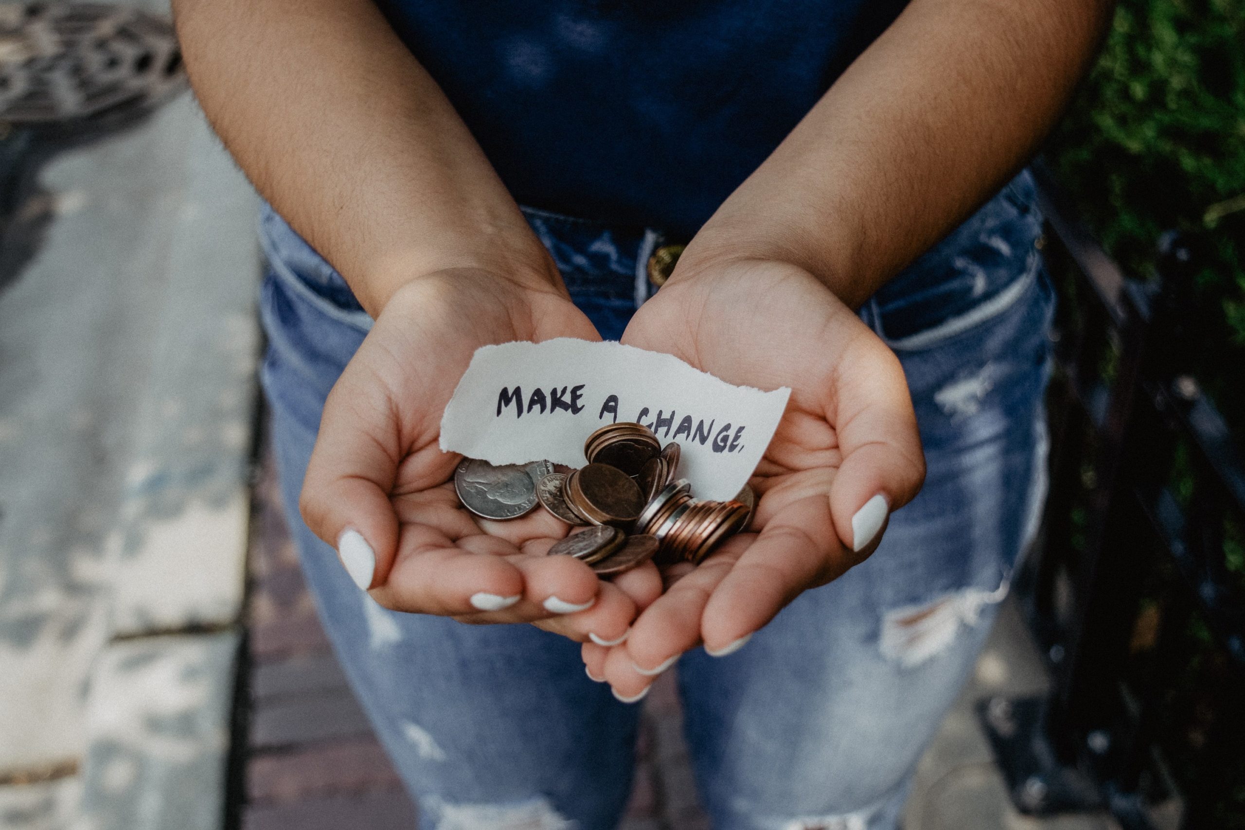 Person holding charitable donations.