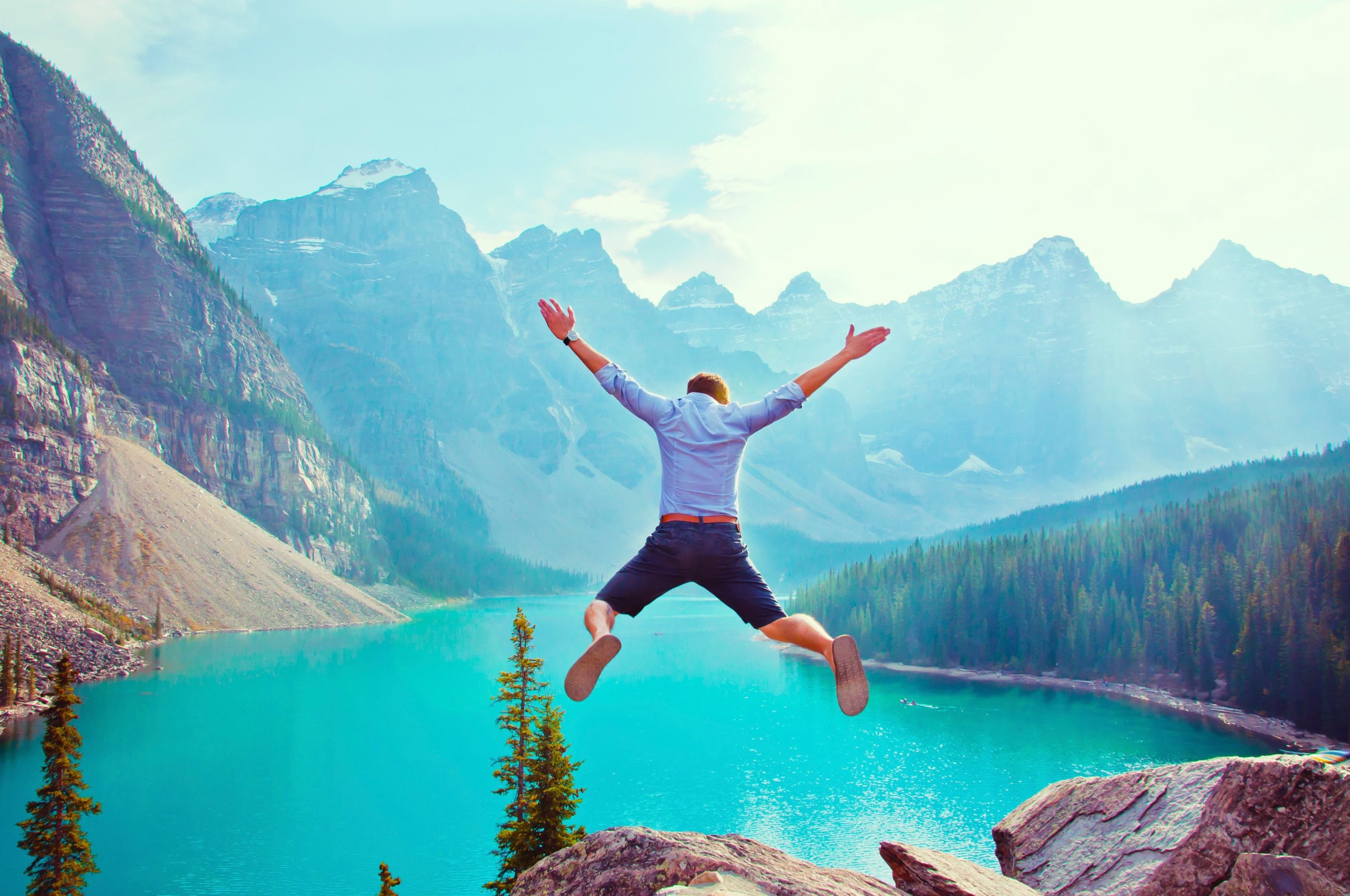 Man jumping from a cliff.