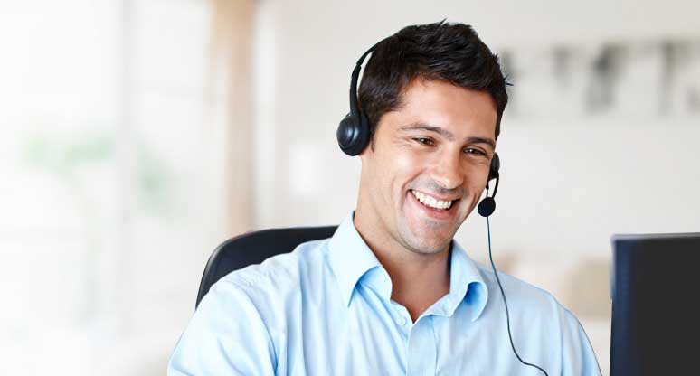 A contact centre employee working alone.